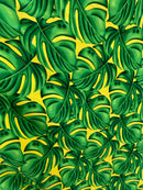 Yellow/Green coloured All Over Monstera Leaf Polyester Fabric
