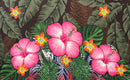 A flat-lay view of the Hibiscus, Plumeria Assortment Sarong (Style 6) featuring a vibrant Polynesian-inspired design. The pattern includes three large, bright pink hibiscus flowers and smaller yellow-orange plumeria blossoms set against a background of lush green monstera and palm leaves. The design is layered with traditional tribal motifs, including a decorative black and white geometric border along the bottom edge.
