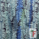 Ocean Indigo Island Canopy Poly Cotton Fabric featuring a dense tropical fern foliage print in shades of blue, teal, and green.