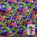 Tropical Hawaiian orchid print fabric in Poni Twilight purple with peach and coral-pink florals.
