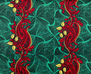 Decorative fabric pattern with red and yellow paisley design on a green geometric background