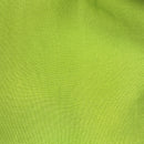 Solid hunter green rayon challis fabric draped in soft, spiral folds. 