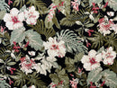 A vintage-style tropical fabric pattern featuring large white and pink hibiscus flowers among lush green monstera leaves and various tropical foliage on a solid black background.